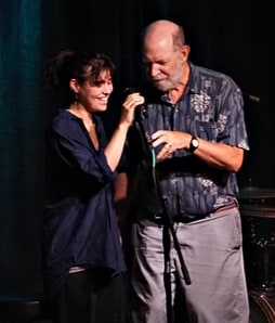 Art encourages some levity at the mic with a vocal student