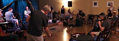 All students playing and listening to play in the round